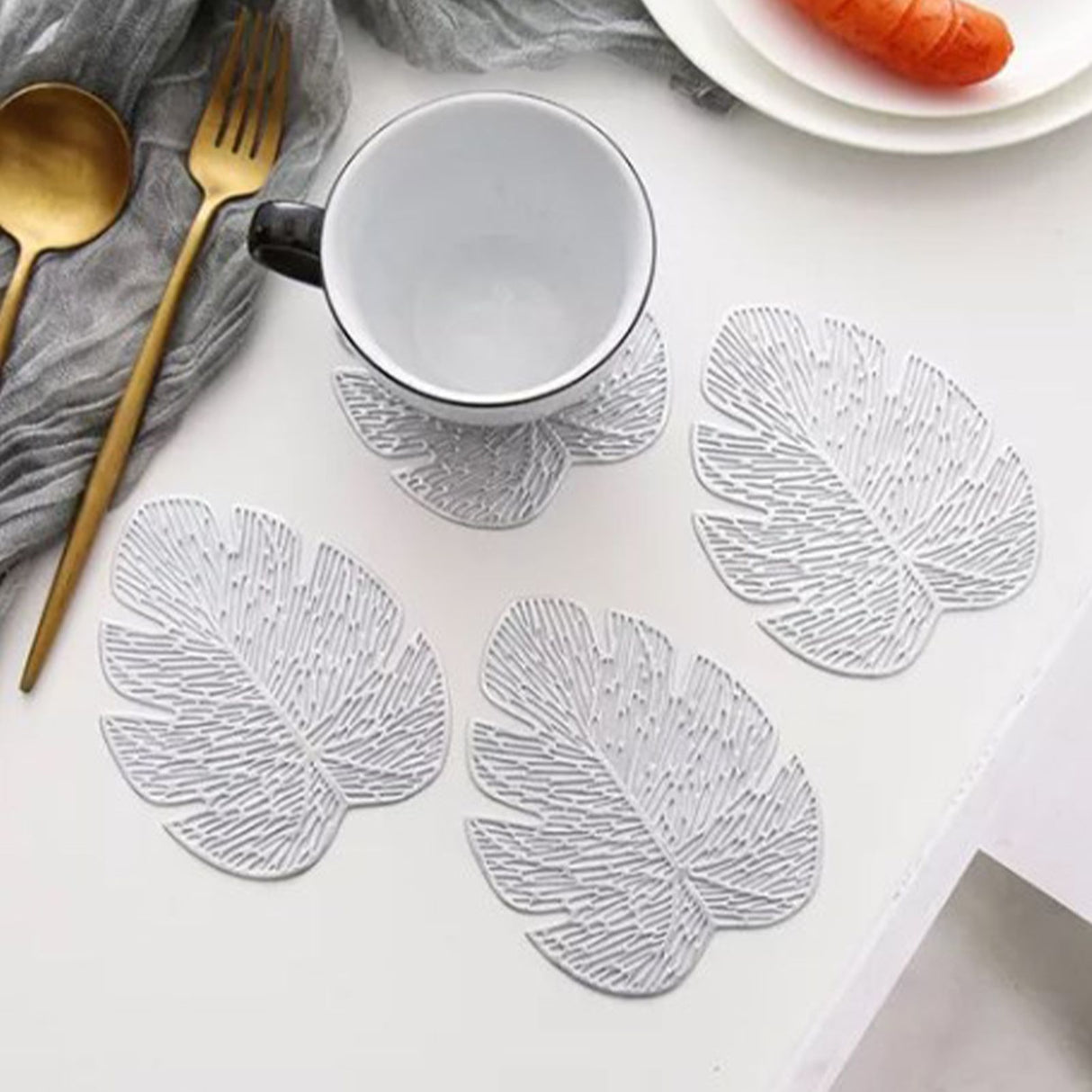 Placemats and Coasters Set Hollow Insulation 6 Pcs Round Dining Table Place Mats and 6 Pcs Leaf Shape Cup Coasters Silver