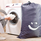 Laundry Bag Nylon Drawstring Cylinder for Household Travel Dirty Clothes Quilt Books Storage Dark Grey Smiling Face