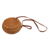 Handwoven Round Rattan Bag Tropical Beach Style Woven Shoulder Rattan Bag with Leather Strap 20cm Diameter Natural Color Oval with Lining - Front View
