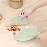 Mini Broom Dustpan Set Smile Face Plastic Handheld Efficient Cleaning Portable Tiny Brush Dustpan for Tabletop Office Green - Close-Up Angle