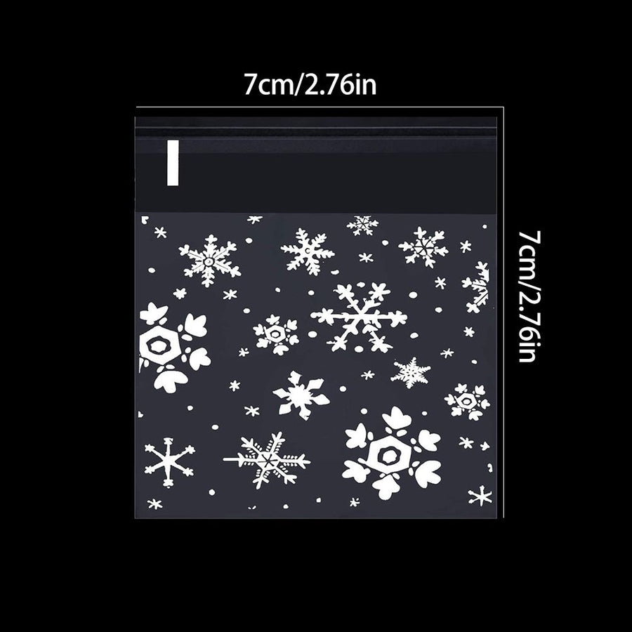 100pcs Christmas Gift Packaging Bag Plastic Packaging Bag Snowfake Printed Candy Package Bag