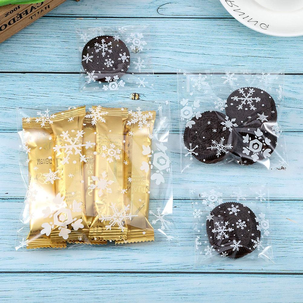 100pcs Christmas Gift Packaging Bag Plastic Packaging Bag Snowfake Printed Candy Package Bag