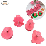 4 Pcs Christmas Biscuits Cutters Set Christmas Tree Snowman Gingerbread Egg Stamper Spring Loaded Handle Cutter - Front View