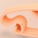 10PCS Kids Storage Hangers Plastic Thicken Bow Knot Coat Drying Hanger for Toddler Baby Orange - Top-Down View