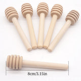 50pcs Honeycomb Stick 8cm Mini Wooden Honey Dipper Sticks Honey Stirrer Honey Wand for Honey Coffee Jam Kitchen Gadgets - Low Angle