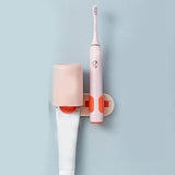 Bathroom Toothbrush Holder Multifunctional Wall Mounted Toothbrush Storage Rack for HouseholdPink Orange with Cup - Rear View