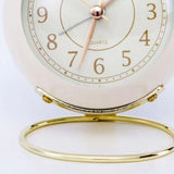Small Round Clock Circular Base Mute Corrosion Resistance Quartz Bedside Alarm Clock with Night Light for Bedroom School Creamy White, Golden Cover - Front View