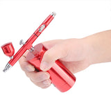 0.3mm Mini Air Compressor Spray Airbrush Set 7CC Capacity - Top-Down View