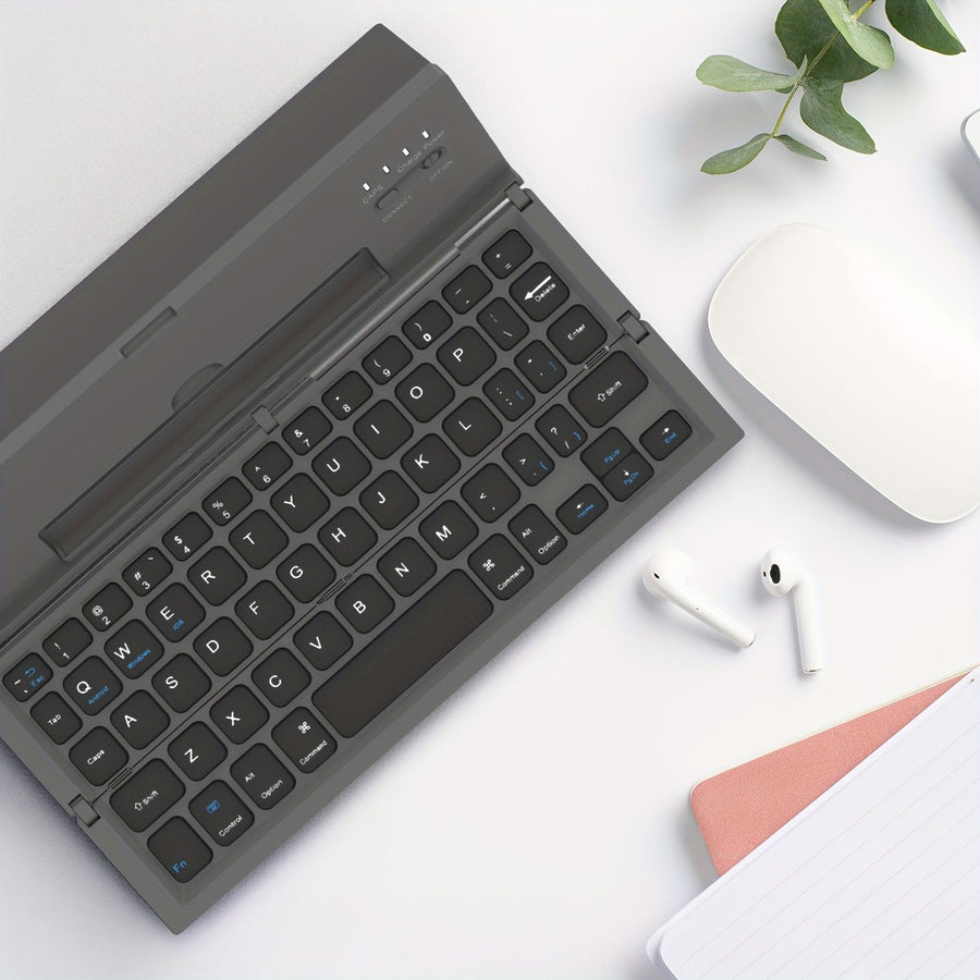 Black foldable wireless keyboard, Broadcom Microchip, US layout keyboard, iOS compatible keyboard, Android compatible keyboard, Windows compatible keyboard, portable keyboard, triple fold keyboard, Australian market keyboard, on-the-go typing