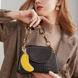 Mini Banana Keychain Coin Purse – Cute Portable Pouch for Backpacks, Handbags and Daily Essentials (Yellow) - 45-Degree Angle