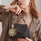 Kiwi Shaped Mini Coin Pouch Keychain, Perfect for Backpacks, Handbags and Daily Carry (Brown) - 45-Degree Angle