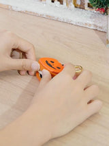 Cute Halloween Pumpkin & Spider Web Keychain Pouches For Bags & Backpacks (Orange) - Close-Up Angle