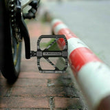 High-Performance Anti-Slip Bicycle Pedals for Mountain and Road Biking - Front View