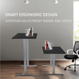 FORTIA Sit To Stand Up Standing Desk 140x60cm 72-118cm Electric Height Adjustable 40kg Rated Black/Silver Frame - Side View