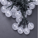 NOVEDEN 100-Bulb Warm White Solar String Lights with 8 Lighting Modes - Front View