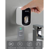 Ecoco Wall mount auto ands Free Toothpaste Dispenser Automatic Toothpaste Squeezer Bathroom Toothpaste Holder Grey - Front View