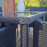 Outdoor Minimalist Black Wicker 6-Seater Dining Set - Top-Down View