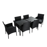 Outdoor Minimalist Black Wicker 6-Seater Dining Set - Rear View