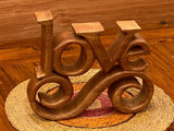 Wooden carved LOVE words decoration 27 cm long - Side View
