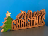Wooden carved Merry Christmas decoration 38 cm long with Tree and Star - Front View