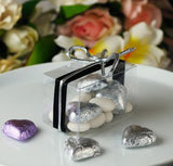50 Pack of 5x8cm Transparent PVC Folding Boxes for Wedding Favors, Jewelry Gifts, Candy, and Soap Packaging - Close-Up Angle