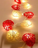 20 Red and White 3D Hollowed Rattan Heart-Shaped 3M String Fairy Lights, Battery (AA) Indoor & Outdoor Decorations Wedding Valentines Romantic Room Table Lighting - Low Angle