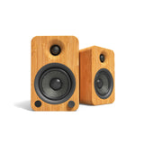 Kanto YU4 140W Powered Bookshelf Speakers with Bluetooth and Phono Preamp - Pair, Bamboo with SP26PL Black Stand Bundle - Front View