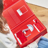 Lexon GIFT Set PANTONE - Includes Mino+ Mini Speaker, Flip Classic Clock, Mina M Lamp, Thykho 3  Speaker - 2035 Red - Front View