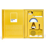 Lexon GIFT Set PANTONE - Includes Mino+ Mini Speaker, Flip Classic Clock, Mina M Lamp, Thykho 3  Speaker - Yellow - Front View