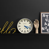 Newgate Luggage Wall Clock Galvanised Blue Hands - Top-Down View