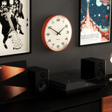 Newgate Radio City Wall Clock Black Arabic Dial - Matte Pumpkin Orange - 45-Degree Angle