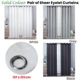 Pair of Solid Colour Sheer Eyelet Curtains 137 x 213 cm Grey - Front View
