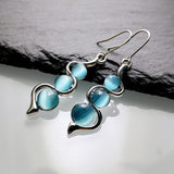 Retro Boho Turquoise Flower Earrings Hook Moonstone Dangle Drop Sapphire Women - 1240 - Top-Down View