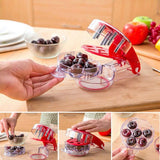 Cherry Pitter Olive Seed Squeeze Tool Handheld Stoner Remover Corer Kitchen Red - Close-Up Angle