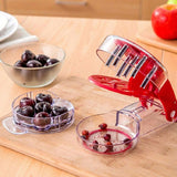 Cherry Pitter Olive Seed Squeeze Tool Handheld Stoner Remover Corer Kitchen Red - Low Angle