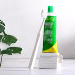Large Bathroom Toothpaste Squeezer Tube Easy Stand Dispenser Rolling Holder Seat - White
