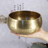 8.5Cm Copper Buddha Sound Bowl Set With Mat Stick & Bag - Close-Up Angle