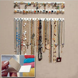 9 Piece White Adhesive Wall Jewelry Hooks - Top-Down View