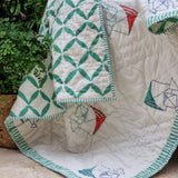 GOTS Certified Organic Cotton Reversible Baby Quilt (100x120cm) - Pretty Kites (Green) - Side View