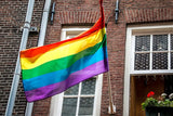 DELUXE RAINBOW GAY PRIDE FLAG Outdoor Banner 150x90cm 3x5ft with Metal Eyelets - Top-Down View