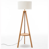 Natural Wooden Tripod Floor Lamp w/ Round Wood Shelf + Off White Linen Shade - Front View