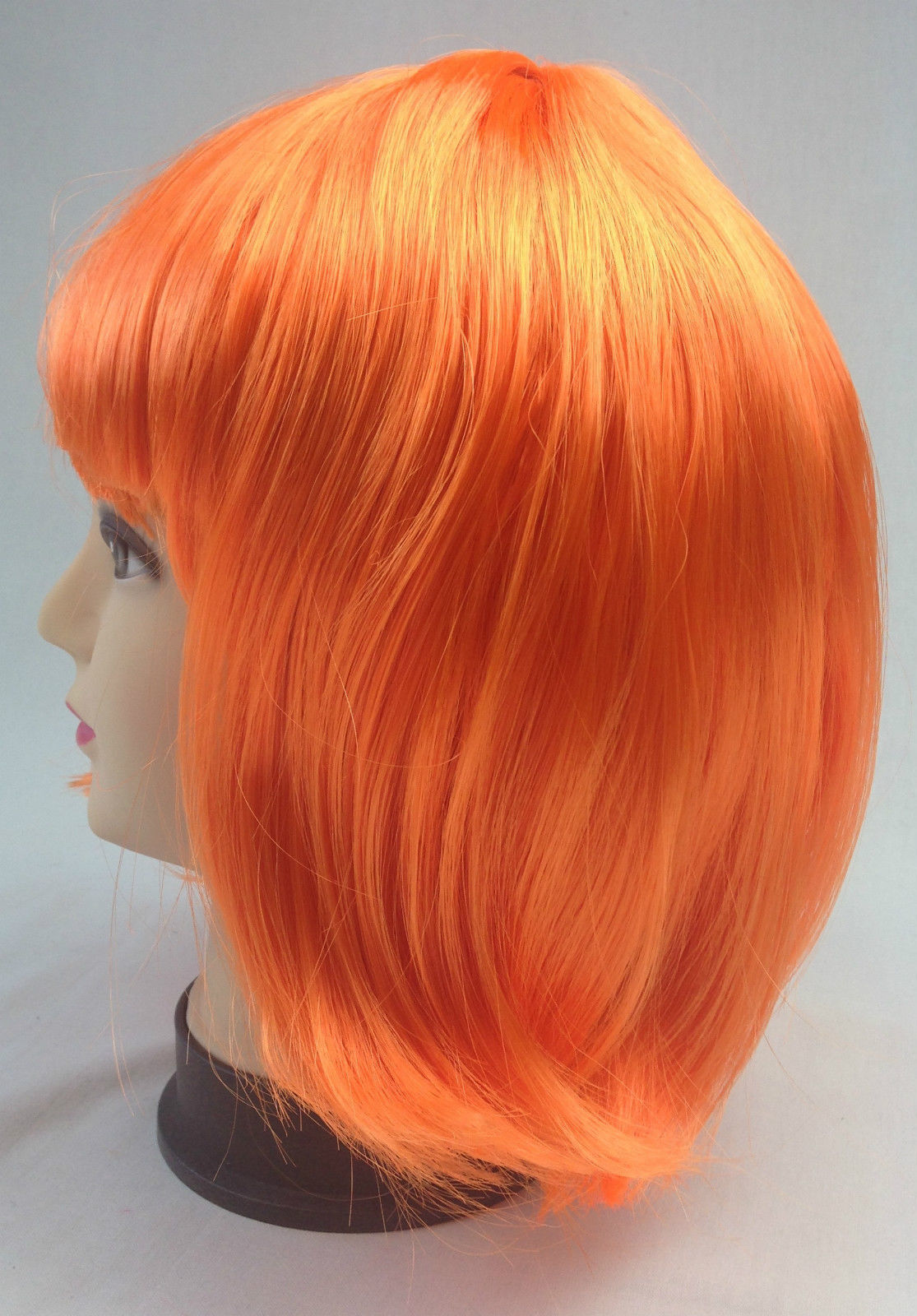 Bright Orange Bob Wig with Straight Bangs for Costume Parties and Cosplay – Adjustable Fancy Dress Accessory for Women