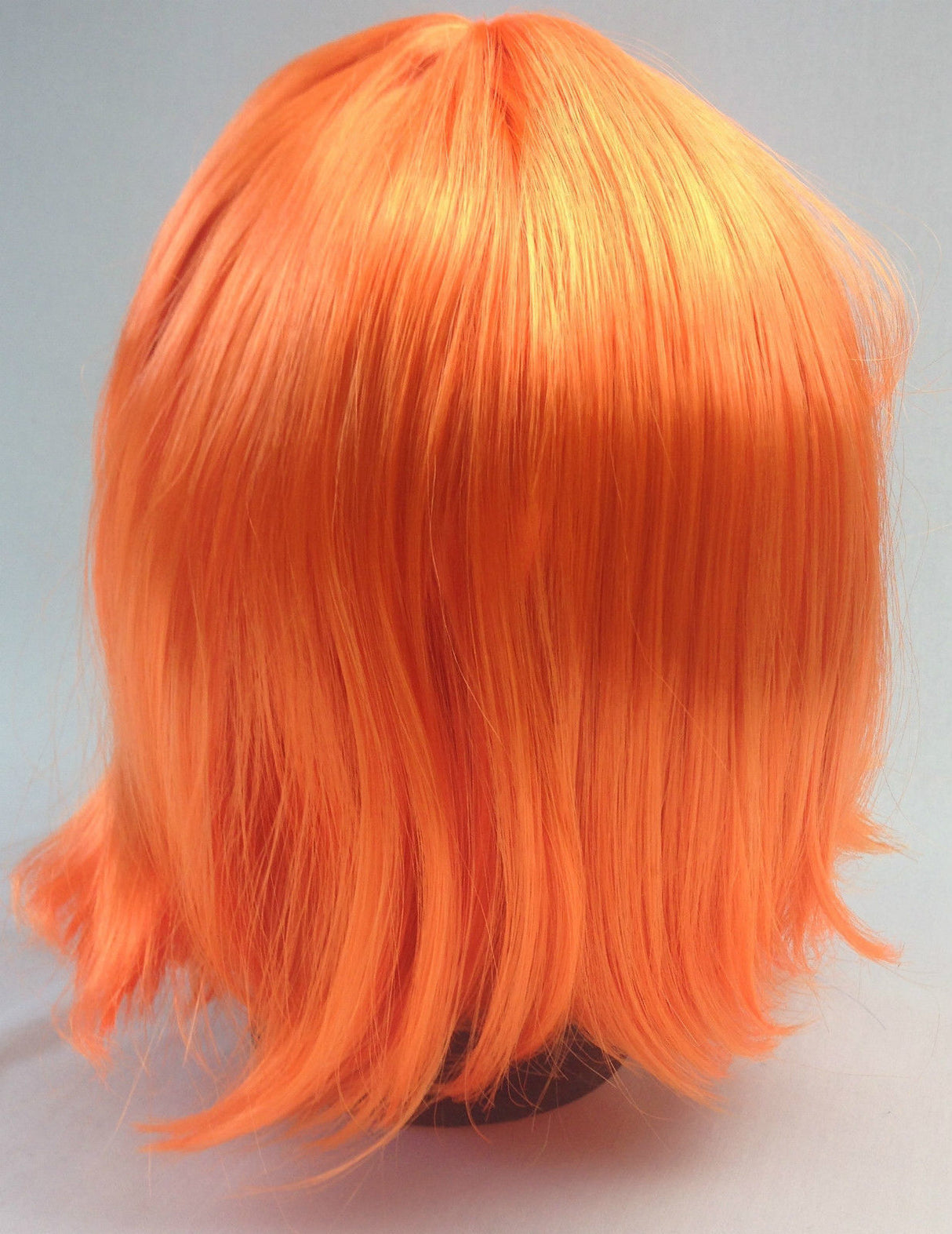 Bright Orange Bob Wig with Straight Bangs for Costume Parties and Cosplay – Adjustable Fancy Dress Accessory for Women