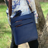 Milleni Womens Italian Leather Bag Soft Nappa Leather Cross-Body Travel - Indigo/Chestnut - 45-Degree Angle