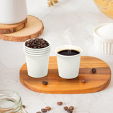2400x 4oz Premium Small Paper Coffee Cups Espresso Macchiato Piccolo Short Black in White - Low Angle