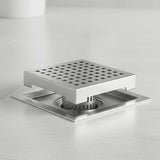15x15cm Square Shower Drain with Grid Pattern Grate – 304 SS, CUPC Certified with Hair Strainer - Close-Up Angle