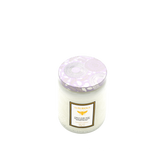 Elegant Embossed Glass Candle with Silk Flower Accents - Top-Down View