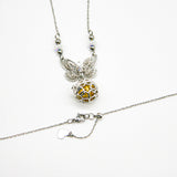 Gift Box - Butterfly White Gold Aroma Necklace + Purify Oil Blend - Close-Up Angle