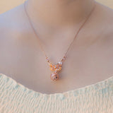 Gift Box - Butterfly Rose Gold Aroma Necklace + Purify Oil Blend - Top-Down View