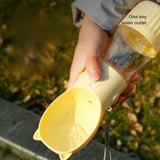 Yellow Portable Dog Water Bottle with Built-in Bowl Dispenser - 250ml Water,180ml Food Capacity, Leak-proof for Travel and Walks - 45-Degree Angle